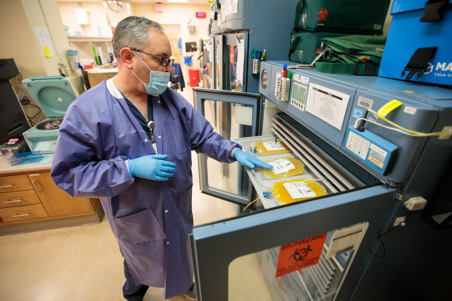 Vince Morton, a medical technologist who lives in Madison, checks the inventory of platelets stored at UMMC's blood bank.
